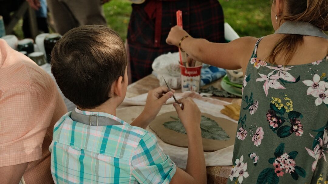 woman teaching children outdoors