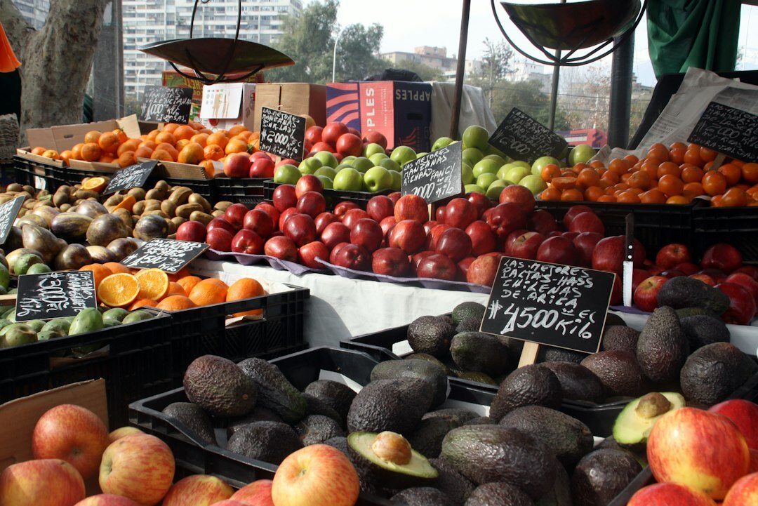 Traditional Chilean market with crowded stalls of fruit and vegetables